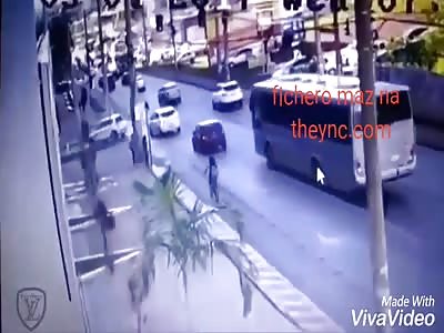 Woman on bicycle run over by bus