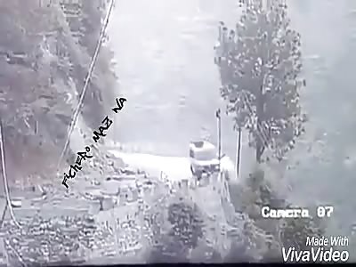 Pickup truck falls into a curve ravine
