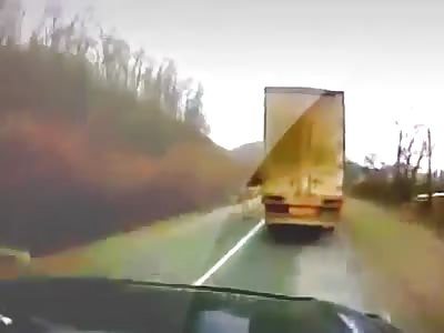 Car crashes with another when trying to overtake truck