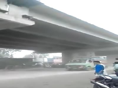 Man throws himself on the wheels of a truck