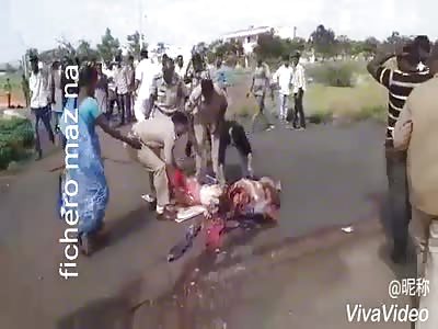Men collect bodies of dead in accident