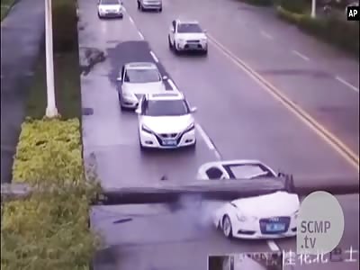 Spectacular pole falls and crushes car (includes aftermath)