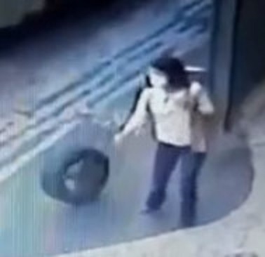 Woman Walking Down Street Knocked Out by Loose Tire