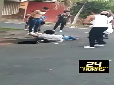 thief beaten with kicks and punch
