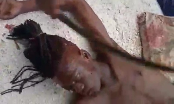 DAMN: Haitian Cop gets Machete to the Face (BRUTAL) 