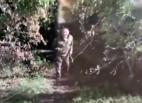 Ukrainian drone scares a ORC carrying a stick