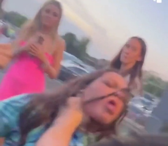 Bouncer in North east England grabs throat of loud mouth girl  