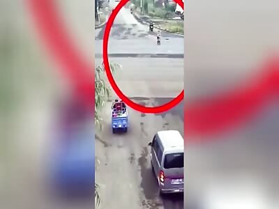 Little girl on bike crashed by big truck 