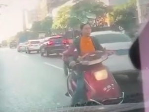 Chinese woman on scooter crushed dead by blue truck 