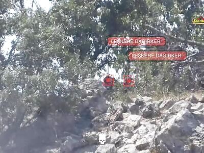 Boom...two Turkish soldiers being attacked with anti-tank weapons