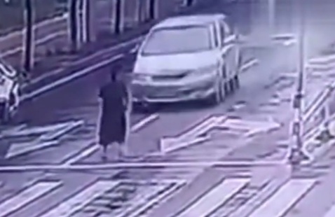 Chinese woman crossing street crushed dead by speeding car 