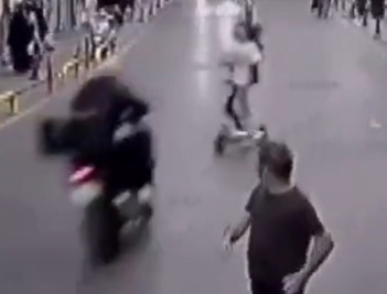 Speeding motorcyclist crush into two girls on electric scooter 
