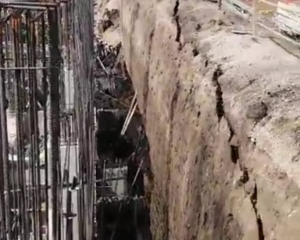 Worker Buried Alive by Collapsing Wall.