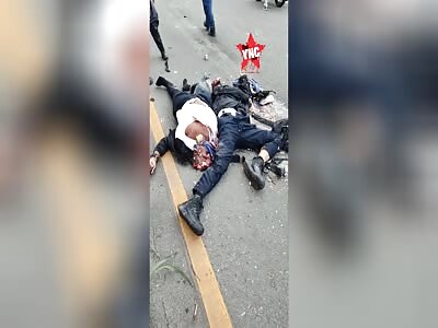 Two motorcyclists crushed by truck in brutal accident 
