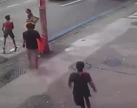 robbers rob a woman and knock out a man who tried to protect her.