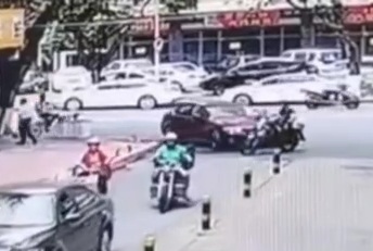 Female Driver Hits Couple on Moped (Action & Aftermath)