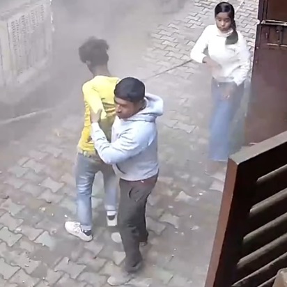 Shocking Footage Shows Building Collapse on Woman & Kid In India