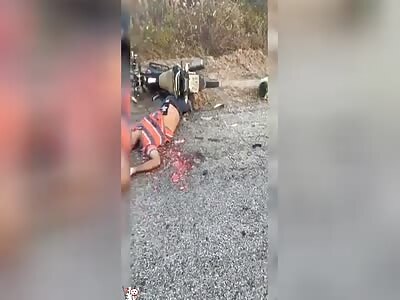 Biker collides into side of a truck ,Brazil