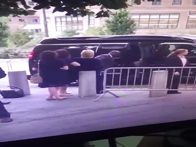 Video of Hillary Clinton carried into van