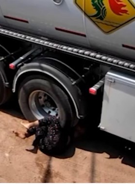 woman threw herself under a truck