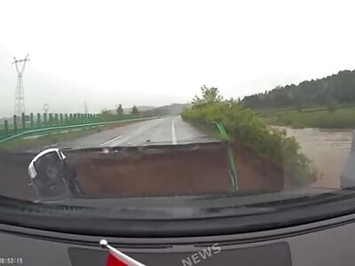 Road surface was washed out after heavy rains