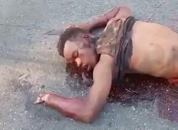 Another gang member gored by angry Haitian peoples 