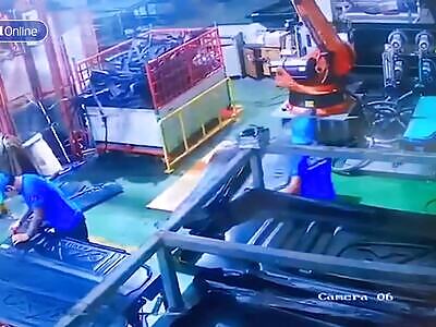 Factory Worker Killed after Getting Pinned by Robot Arm. 