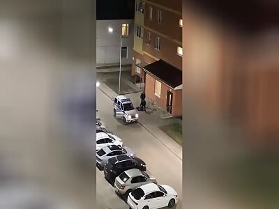 Police Officers Beat Man and Leave Him Lying near Entrance