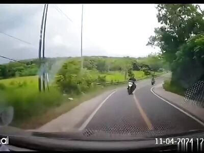 Dashcam:Scooter biker collides with a car