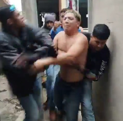 Robber captured stealing beaten by locals