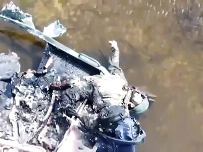 A dead russian soldier and his shipwreck in Ukraine