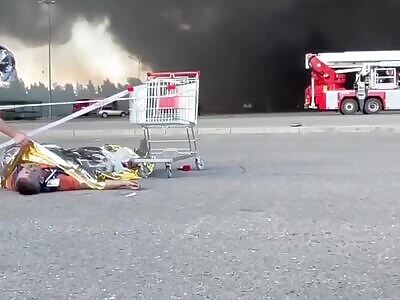 Grisly Scene Following Russian Bombing of Ukrainian Retail Store
