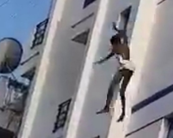Man throws Himself Down from a High Window.