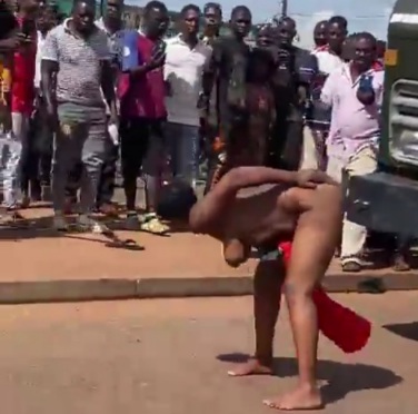 Ugandan Chick Stripped Naked in Middle of Road