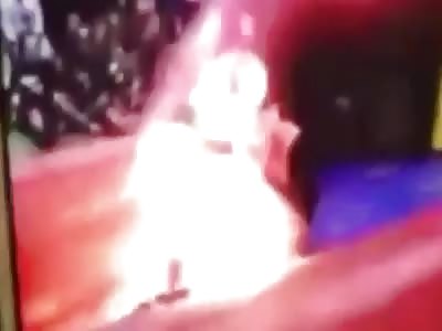 Hot Performance. Performer Engulfed in Flame
