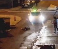 A Taxi Runs Over A Man Laying On The Road 