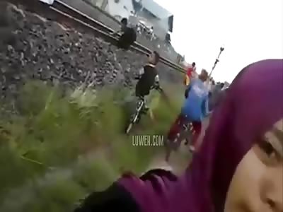 Shocking. Young Boy Hit by Train Captured on a Girl's Selfie