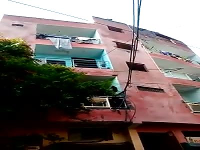 Free Fall. Woman Commits Suicide by Jumping from Top of a Building