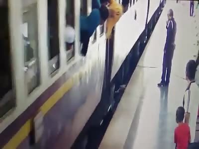 Man Trips and Falls Under a Train While Deboarding