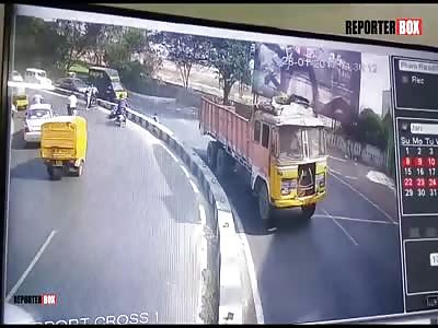 Motorcycle Rider Ran Over by Truck Traveling on the Opposite Lane (With Aftermath Pics)