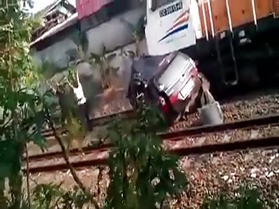 Second Train Crashes the Car with Passenger still Stuck Inside
