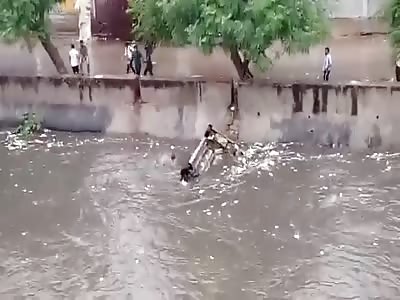 Man Drowning in Filthy Flood Water