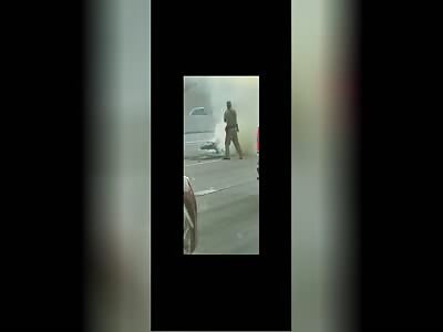 Motorcyclist body burns on top of his bike after crash