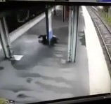 OMG: Dude Sliced in Half on Train Station Platform