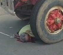 Old man crashed dead under truck 