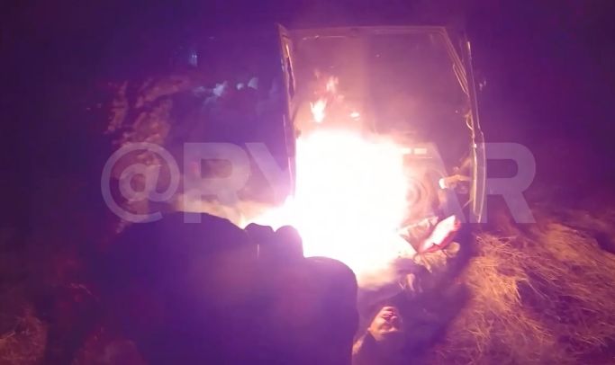 Russian special forces ambush Ukrainian vehicle and burn bodies. 