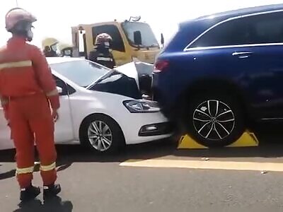 Young Female Crushed Between Vehicles