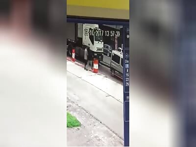 Woman crushed by truck