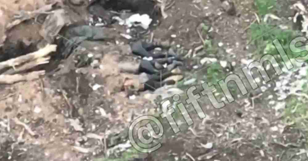 Large Ukrainian trench with 23 dead after artillery attack. 