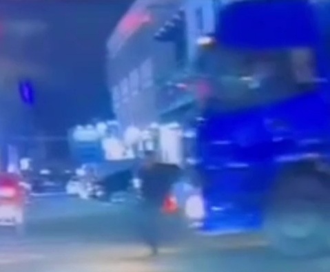  Pedestrian crashed dead by big blue truck 